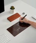 Person writing on Your Desk Go To Weekly Glass Dry Erase Board With Detachable Wood Stand In Burgundy Red Small Desktop Calendar To Do List Planner Whiteboard 12x6 with marker