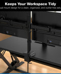 Close-up of Dual Monitor Standing Desk Converter with 36 Inch Wide Surface and dual monitor mounts on a tidy workspace