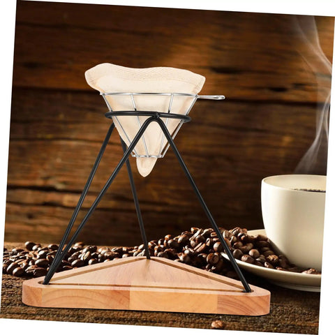 Heavy Duty Reusable Stainless Steel Coffee Filter Holder With Secure Drip Rack And Premium Filter Cloth Set For A Smooth Daily Grind Setup At Home Or Office on wooden base with coffee beans.