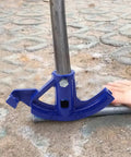Heavy Duty Manual Steel Pipe Bender for 5/8 to 1 1/4 Inch copper, showing blue tool bending a pipe on ground.