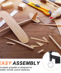 DIY airplane assembly with Six Inch Plastic Propeller Blades With Hooks For RC Planes And Helicopters, craft supplies visible