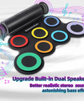 Roll Up Electronic Drum Pad Kit with 7 Pads, MIDI Output, headphones, and dual speakers, shown with musical notes.