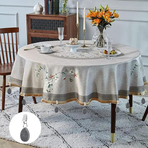 4 Pack Tablecloth Weights Hangers Stone And Metal Drop Weights Clips For Outdoor Picnics And Banquets Heavy Table Cover Clips To Prevent Slippage Gray attached to tablecloth in dining room.