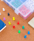 Killer 600 Color Push Pins With Solid Steel Points For Bulletin Boards Maps And Office Desks Sweet 1 Inch Standard Thumb Tacks in assorted colors on corkboard.
