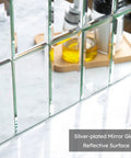 Close-up of Beveled Silver Mirror Subway Backsplash Tiles for Kitchen and Bathroom, 3x6 Inch, clear mirror reflective surface.