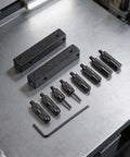 Digital Caliper Accessories Set Internal External Groove Step with black clamps and precision heads on a metal surface.