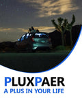 Car parked under night sky with rooftop luggage, desert landscape