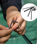 Dope Baluue Hex Key Wrench Set L Shaped Carbon Steel M3 To M6 Flat Head Nickel Plated Heavy Duty Bike Repair Home Toolkit 4pc Sturdy Tools No Slip Grip, hand holding black hex key