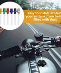 Motorcycle with Six Pack Gas Cap Vent Tube Kit for ATVs, aluminum breather hose, six colors, scenic highway background.