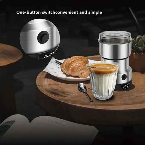 Electric Coffee And Spice Grinder Handheld 150W Quick Grinding With Stainless Steel Blades next to coffee and croissant on table
