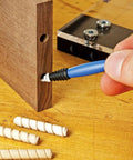 Silicone Mini Glue Brush 2-Pack for Woodworking and DIY Crafts in use, applying glue to wood joint, showing flexible silicone tip.