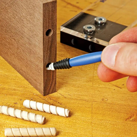 Silicone Mini Glue Brush 2-Pack for Woodworking and DIY Crafts in use, applying glue to wood joint, showing flexible silicone tip.