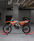 Heavy-Duty Front And Rear Paddock Stand Set With 850 Lb Capacity Bike Lift Wheel Stands holding motorcycle in garage