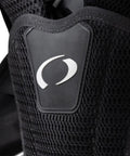 Close-up of Photon Pro Women's Back-Inflation BCD With Modular Harness And Integrated Weight System showing logo detail.