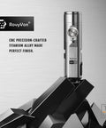 A4 Pro Titanium Keychain Flashlight Ultra Lightweight 0.85 oz Titanium EDC Torch displayed on abstract metal design