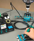 Hand using 200W Micro Soldering Kit with Pro Grade Precision Iron Station for PCB work, showing 11 tips and lead-free solder.