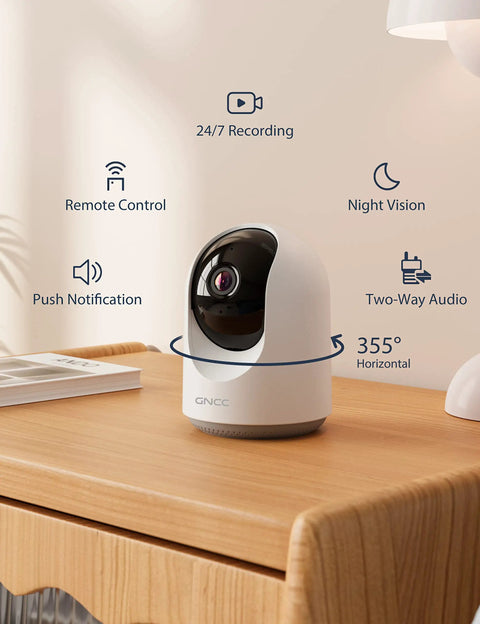 Indoor Pet Camera For Home, Baby Monitor And Dog Camera With Night Vision, 2-Way Audio, 360 PTZ Remote Control on table