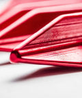 Close-up of 7075 Aluminum Tent Stakes 15 Pack Ultralight Tri Beam Pegs with pointed tips for camping hiking and backpacking