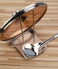 Heavy Duty Stainless Steel Pot Lid Holder And Integrated Spoon Rest Multipurpose Kitchen Utensil Caddy on wooden countertop