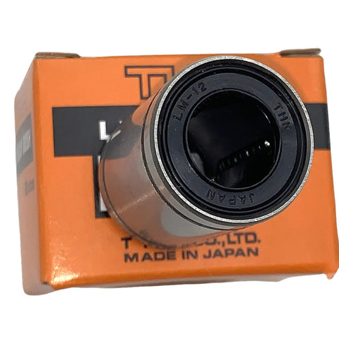 Close-up of LM4UU Through LM20UU linear bearing in packaging marked LM-12, Japan, suitable for CNC use.