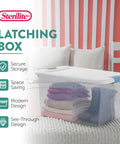 64 Quart Clear Latching Storage Boxes 4 Pack With White Lids, showing stacked sweaters and boots inside clear bin.