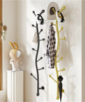 Decorative Wall Mounted Coat Rack Creative Vertical Storage System shown in black and gold, organizing jackets and bags in stylish entryway.