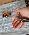 Built Tough As Nails Yellow Nylon Swivel Caster Wheels Metric Threaded Stem showcased in hand for office chair upgrade.