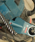 Close-up of SDS Max Speed Xtreme Rotary Hammer Bit with 100 Percent Carbide Head Four Cutter Design in drill. 