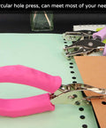 Two Pack One Quarter Inch Hole Punch For Paper Crafts Handheld Circle Punch with pink grip punching paper