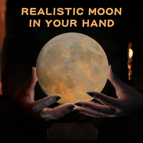 Hands holding Levitating Moon Lamp With Hovering Glow, Rotates In Air, LED Table Night Light, Touch Control Dimming, 3 Color Modes.