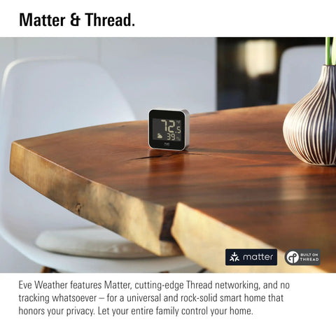 Outdoor Weather Station With Matter Connectivity And Siri Voice Access For Real Time Temperature And Humidity Weather Trend No Fuss IPX4 Water Resistant Display Wireless Setup Thread Border Router Required Works With iPhone And Android on a wooden table