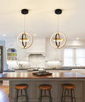 Sleek Dope Modern LED Chandelier With Adjustable Round Ring Design Three Interlocking Rings 4000K in modern kitchen setting