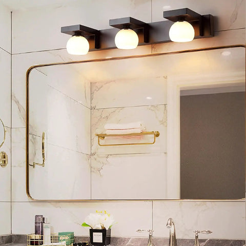 Lit Bath Wall Light With Three Flame Glass Lampshade G9 Cabinet Chandeliers For Bathroom above mirror in modern bathroom.