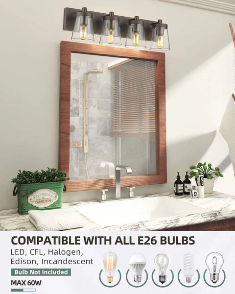 Four Light Bathroom Vanity Lighting Fixture With Clear Glass Shades In Oil Rubbed Bronze Finish above a bathroom mirror