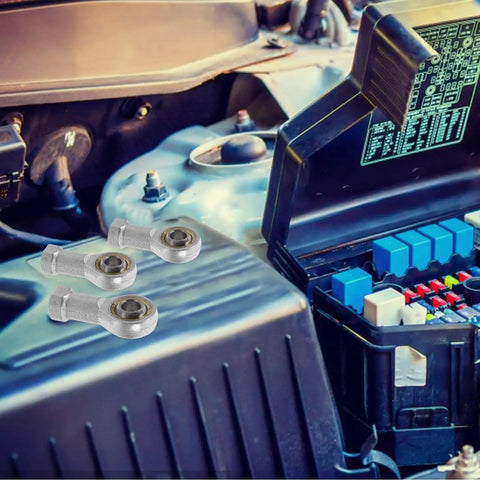 Bulletproof M10x1.25 Internal Thread Rod End Bearings With Fish Eye Radial Joints on engine compartment background.
