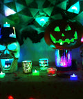 Halloween display with Color Changing LED Tea Lights 24 Pcs Flameless Tealight Candles No Flicker Safe For Kids 7 Color Cycle