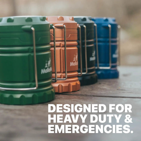 4 Pack Multicolor Camping Lanterns for power outages displayed in blue, green, and orange with text 'Designed for Heavy Duty & Emergencies'.