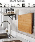 Pair Of Heavy Duty Folding Shelf Brackets, Rock-Solid No-Fuss Triangle Wall Mounted Brackets For Tools And Shelves, Space Saving Fold-Up Support, 30 X 16.3 Cm, Sturdy Steel Construction shown with wooden board in kitchen.