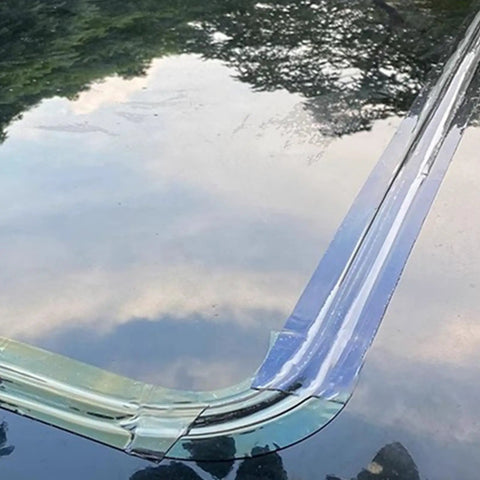 Installed clear sunroof sealing tape for leak prevention and waterproof repair on panoramic sunroof, close-up view.