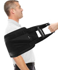 Transfer Sling and Gait Belt for Elderly and Disabled with person demonstrating use of dual grab handles and easy lift straps in black.