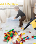 Heavy Duty Handheld Steam Cleaner For Deep Kitchen And Bath Scrubbing in use, cleaning toys on carpet with child nearby.