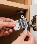 Person installing Set Of 8 3/8 Inch Inset Cabinet Hinges With Self Closing, Flush Mount, Soft Close Action, Silver Nickel Finish.