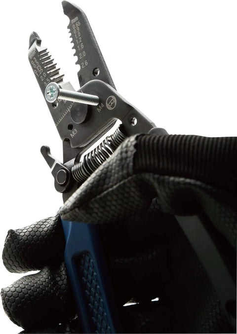 Close-up of Compact Japanese Made Wire Stripper With Screw Cutter for small gauge wires, 6.4-inch length, in use.
