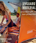 Side view of a lightweight beach shade tent with pre-attached poles, large sun shelter, extended floor, and roof for easy setup.