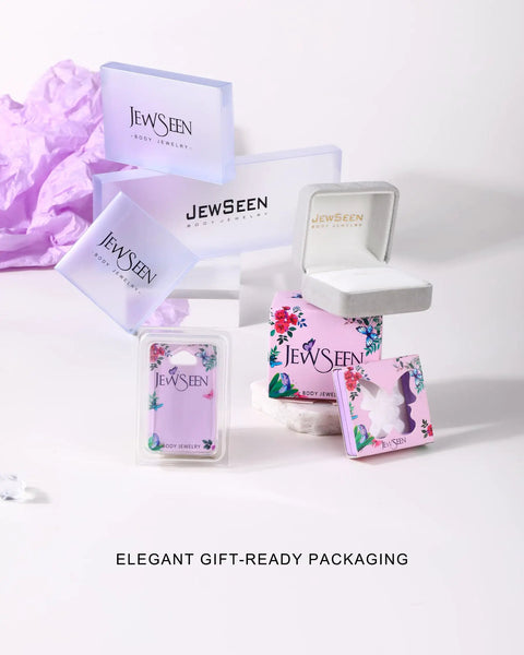 Elegant gift-ready packaging for Jewseen jewelry, featuring flower designs and white boxes with purple accents.