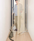 Tough As Nails Extra Tall Cat Gate Heavy Duty Steel Barrier With Foolproof Paw Lock Fits Doorways One Way Swing Door in use with cat.