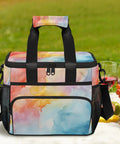 Insulated Picnic Backpack Lunch Bag For Women And Men, vibrant design, large capacity, on a picnic blanket with fruit and wine glasses.