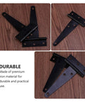 Rustproof Iron T Shaped Hinges for Doors, Gates, Sheds, Fences and Wooden Boxes, black-coated, on wooden surface