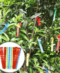 Garden grafting tool kit (front view) with colorful plastic grafting clips, tapes, and labels.