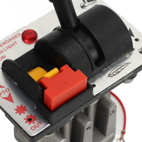 Close-up of Proportional Control Valves With PTO Switch For Dump Truck Hydraulic System showing tipper switch and warning light.